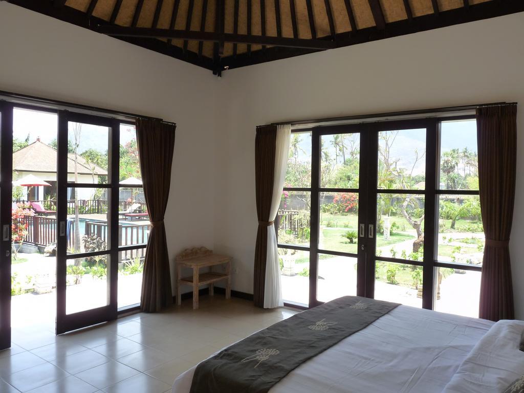Taman Dewi Sri Villa et Bungalow Pemuteran Zimmer foto