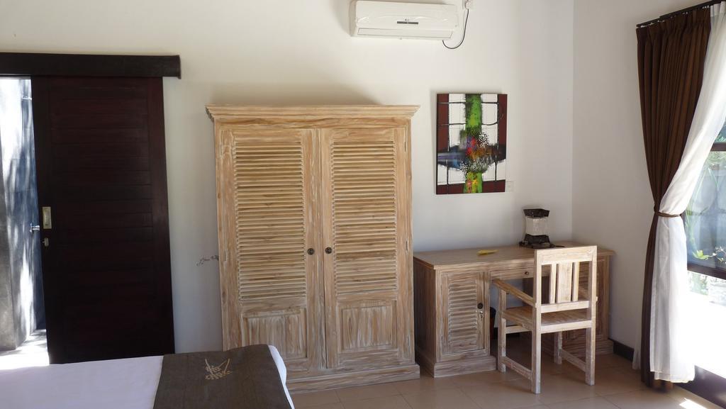 Taman Dewi Sri Villa et Bungalow Pemuteran Zimmer foto